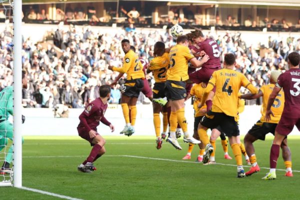 John Stones' Last-Minute Strike Secures Manchester City's 2-1 Victory Over Wolves