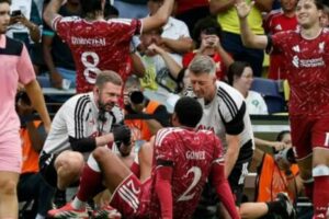 Victory with a Twist: Gomez Injury Steals the Spotlight from Iraola's Dream Liverpool Debut